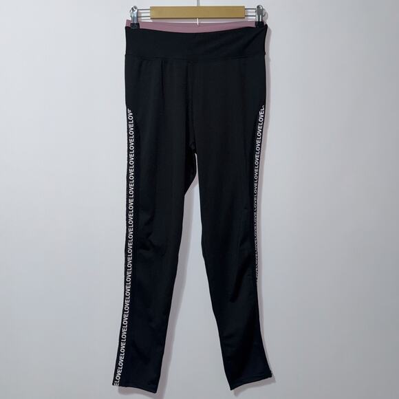Leggings black & purple women’s size large/XL - Picture 1 of 4